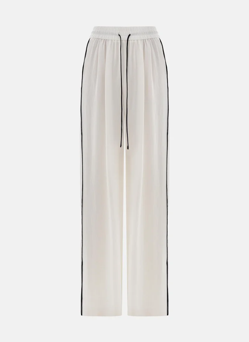 ليتشي بنطال فضفاض مع حواف وحزام متباينين